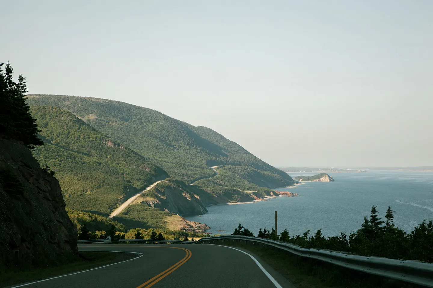A winding coastal highway overlooking the Atlantic Ocean.